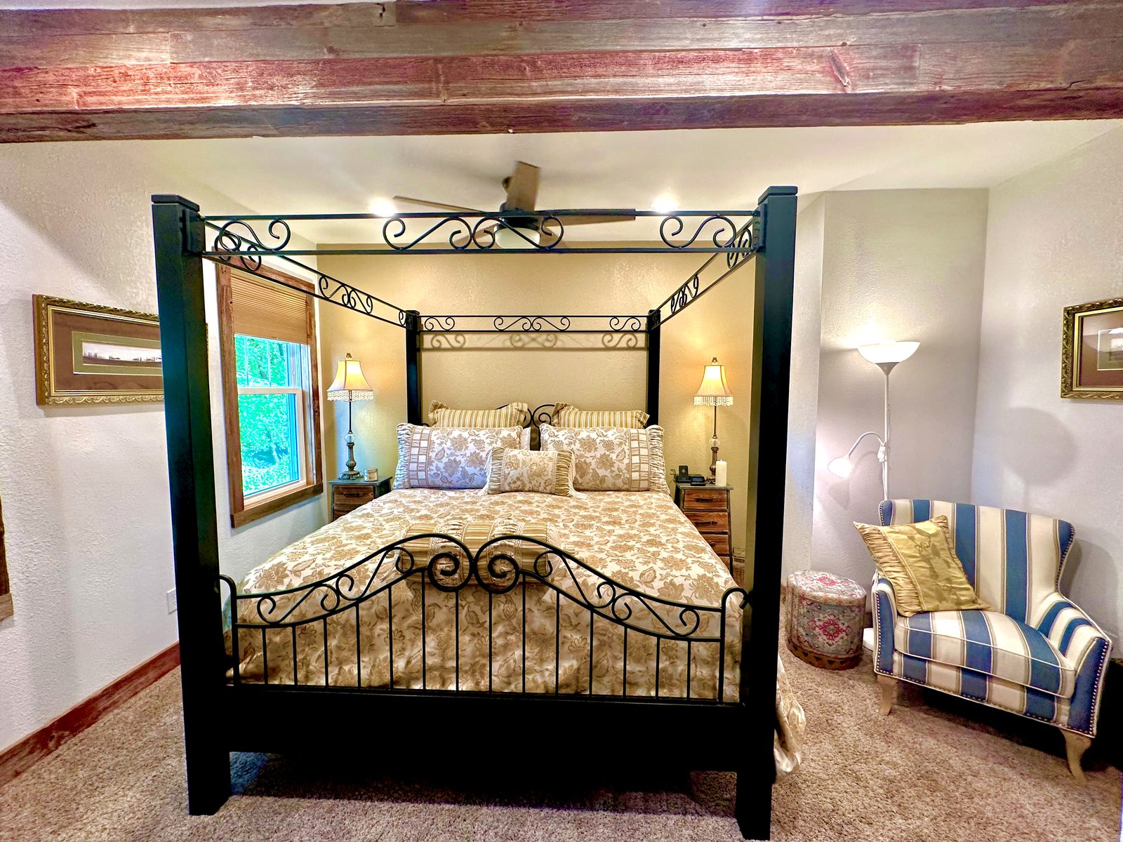 King wrought-iron canopy bed