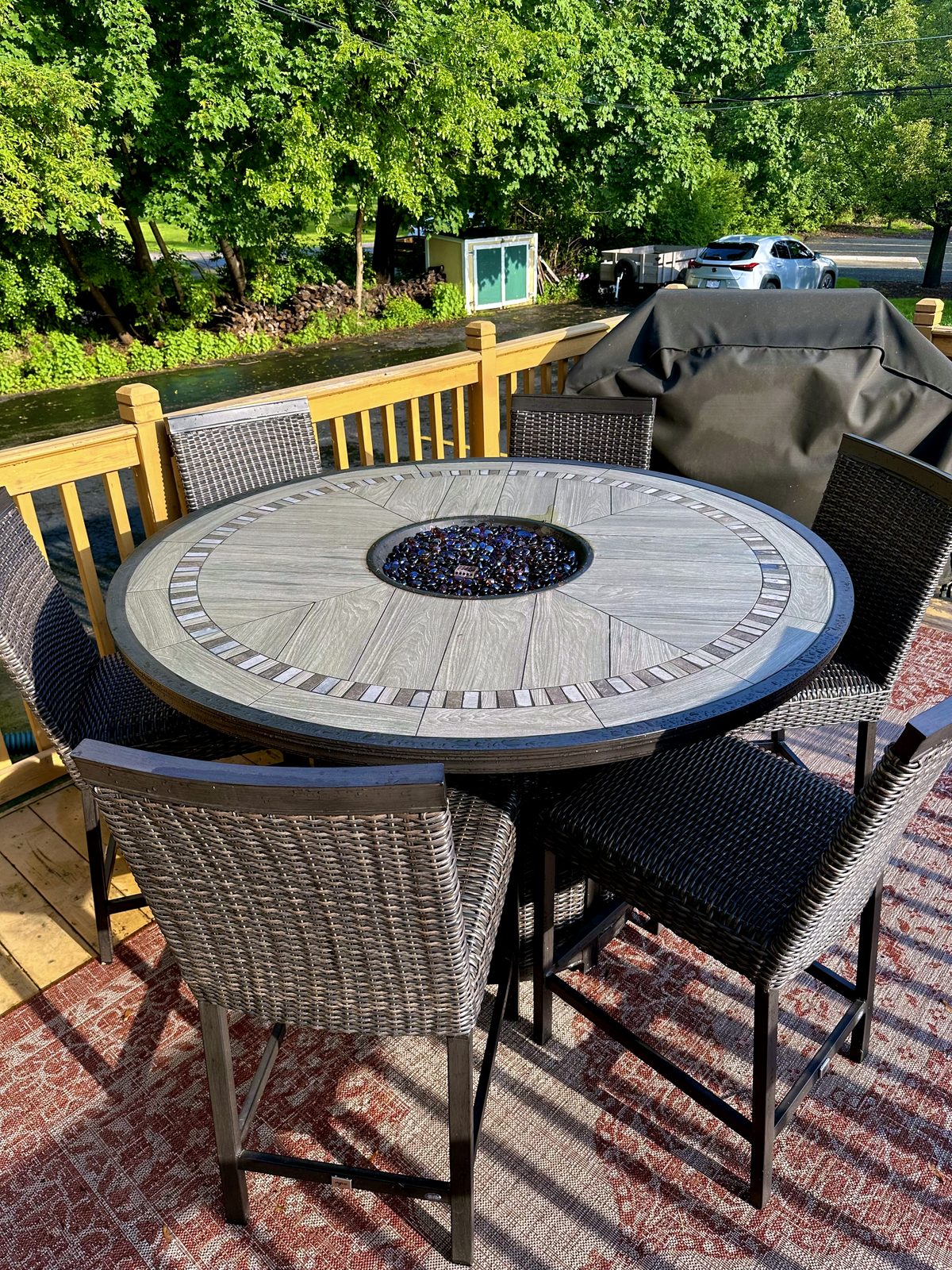 Deck seating around a round fire table