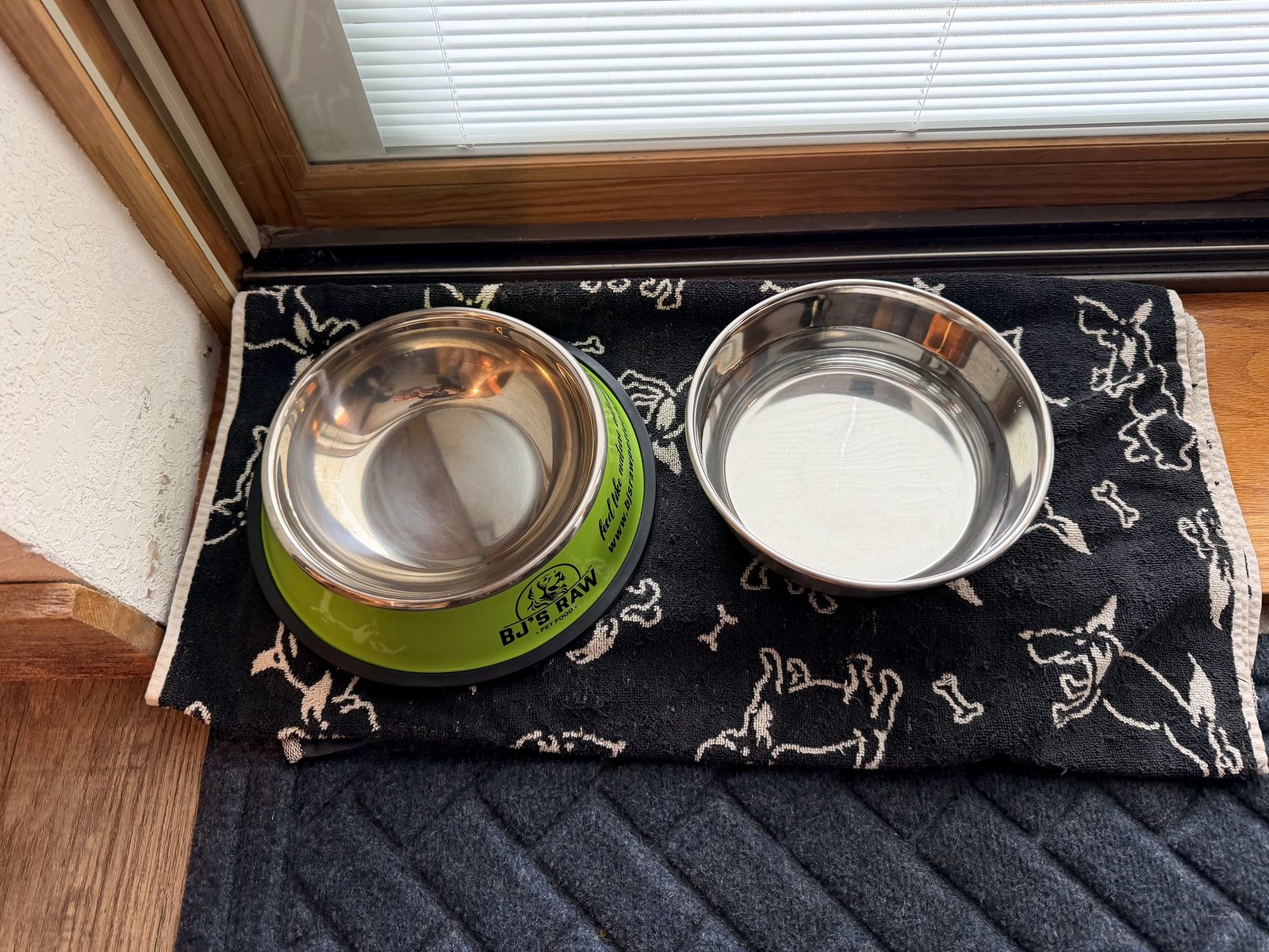 Dog food and water bowls ready by the door