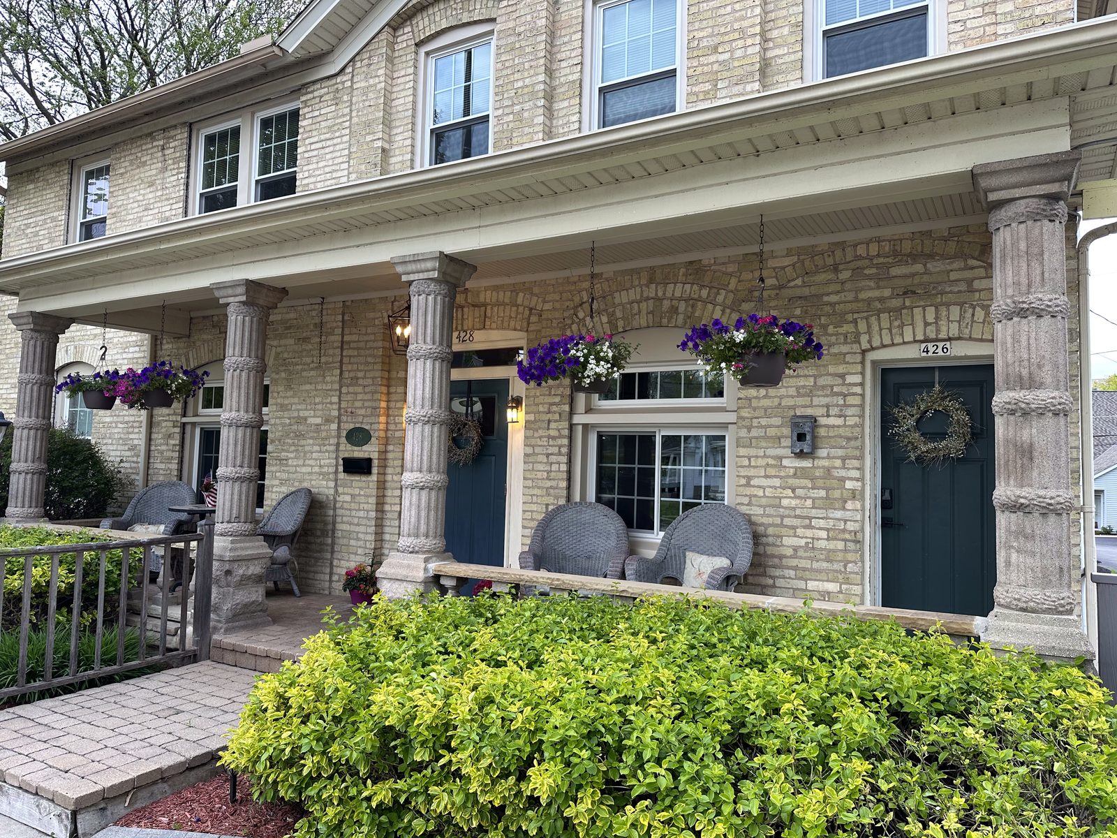 Front porch and entrances of the Cream City Brick house
