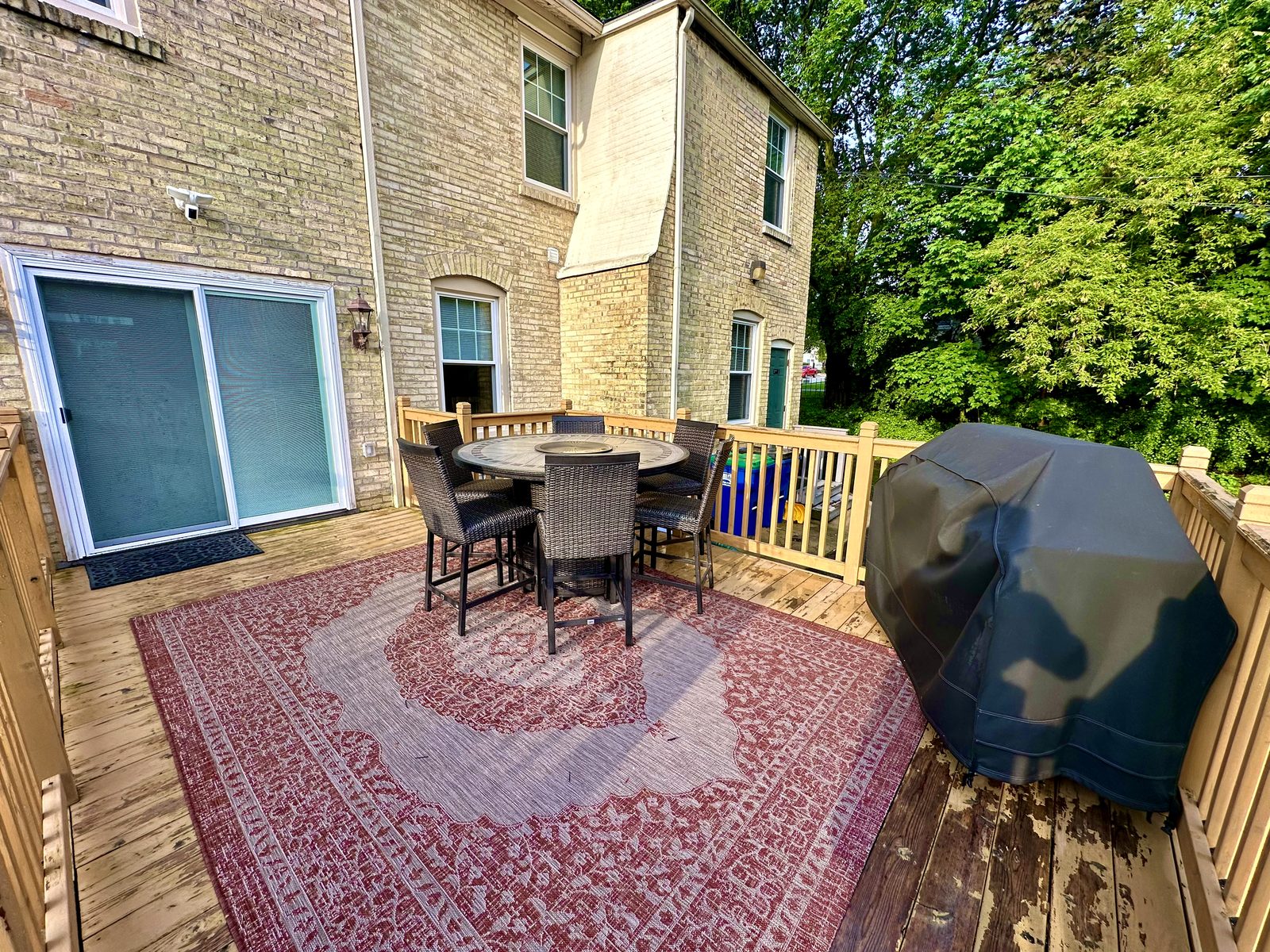 Back deck dining area and covered grill