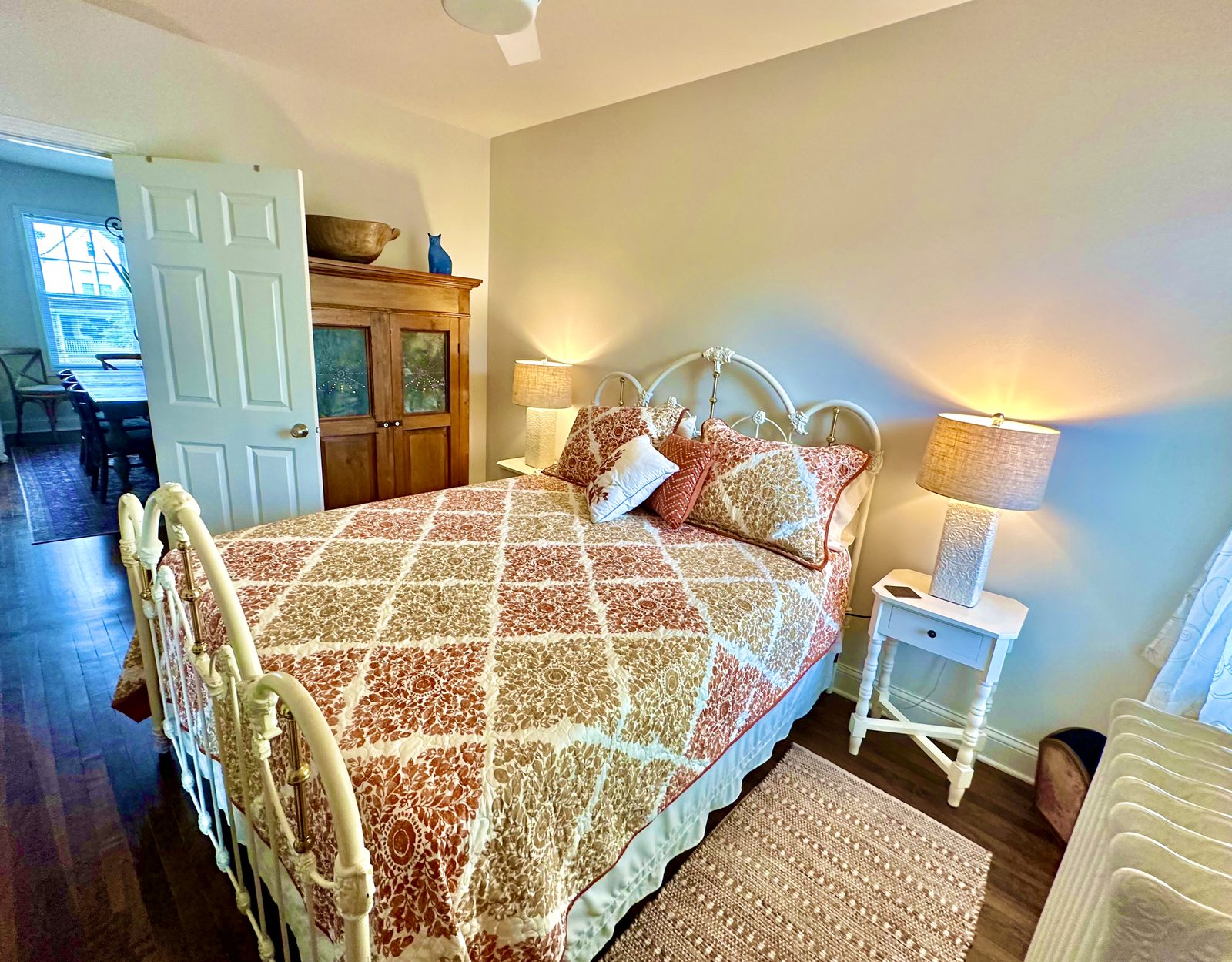 Bedroom with white iron bed