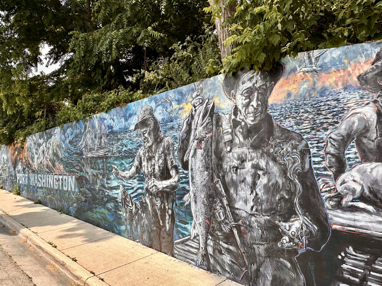 Port Washington fishing mural along a lakefront wall