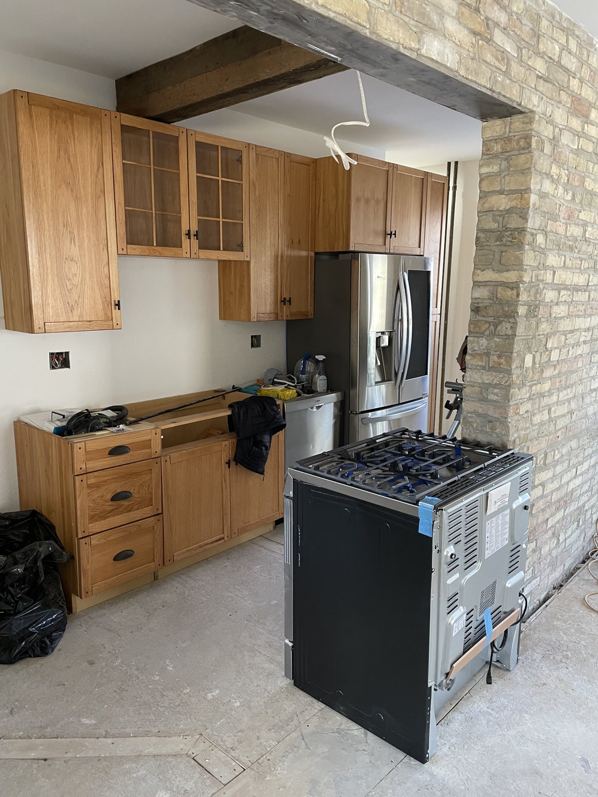 Mar 2022 · The kitchen goes in against the brick